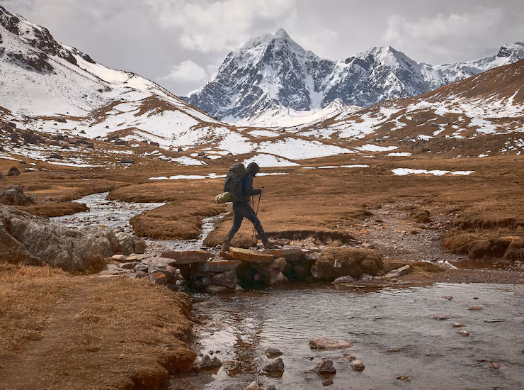 young-hiker-trekking-tour-through-beautiful-andes-mountains-peru_181624-48694